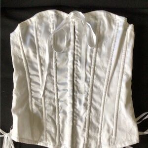 Women’s white corset with boning and lace details